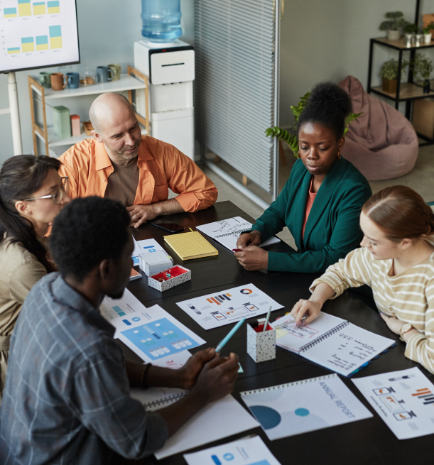 a small business team discussing government compliance